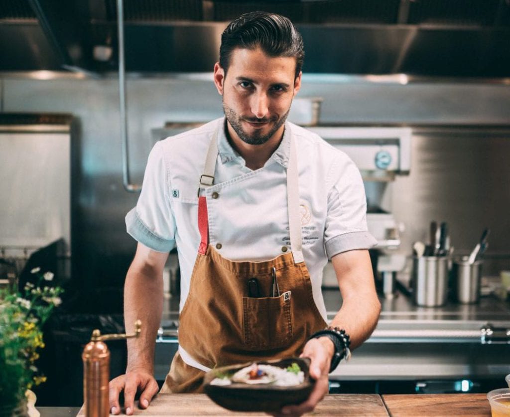 Handsome chef cooking